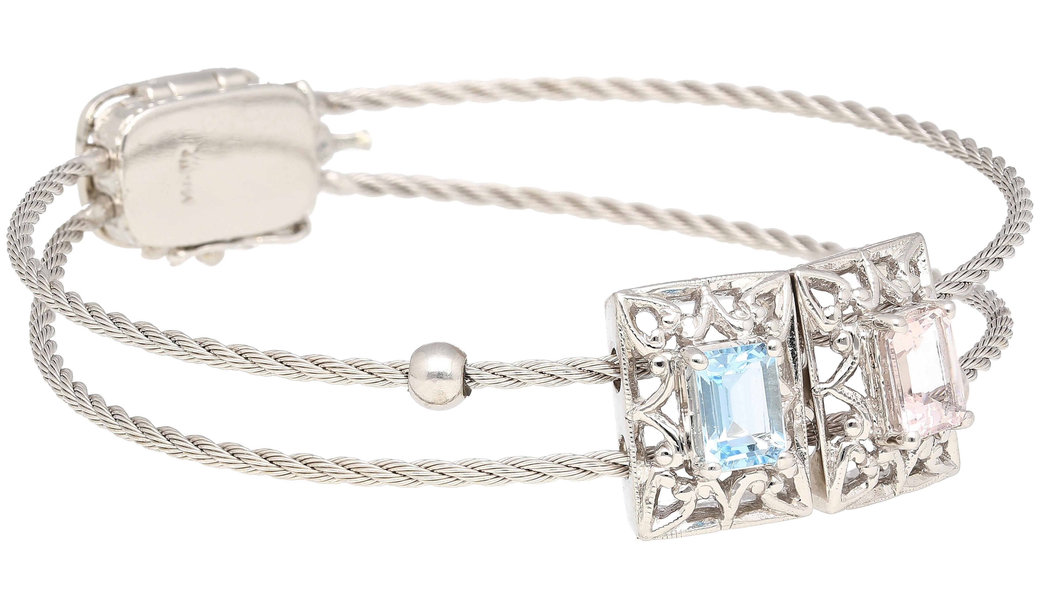 Elevate your jewelry collection with this Vintage Charm Bangle, where timeless elegance meets modern sensibility. Crafted from 14K white gold, its slender 1.6mm width chains gracefully encircle the wrist, offering a comfortable fit. The focal points