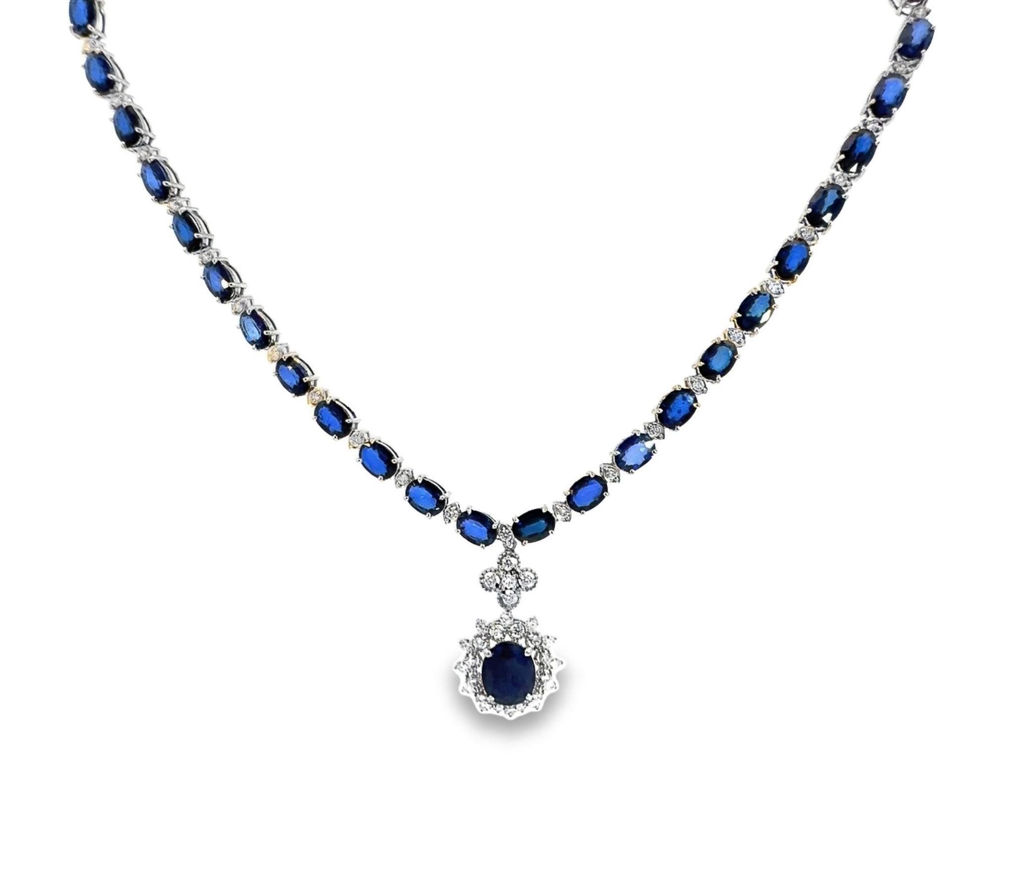 Item #8162

14K Ladies Sapphire and Diamond Necklace 44.64ct Sapphire 2.67ct Diamonds. Fourteen karat (14K) white gold natural sapphire corundum and diamond necklace. 
Oval brilliant cut natural sapphire corundum gemstones are mounted in the center
