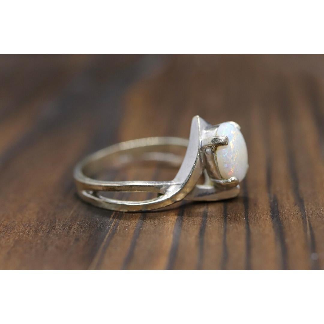Women's 14k Large Opal Solitaire Claw set ring. Opal Bypass solitaire band. For Sale