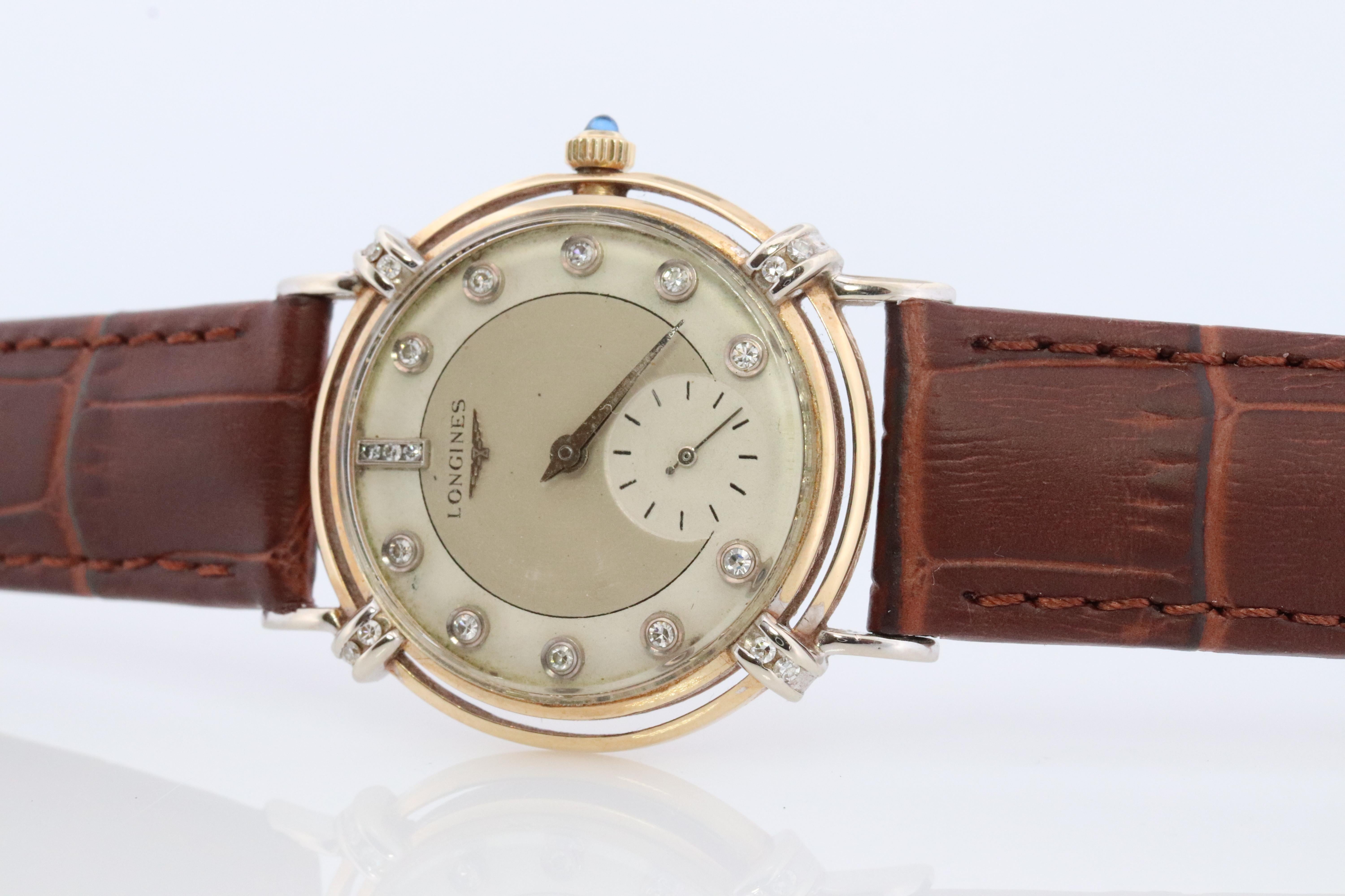 Extremely Rare late 50s Longines  14k white and yellow gold Men's wrist watch. Face and lugs are decorated with diamonds. Sapphire cabochon crown.

22L mechanical movement.

33mm Case. 18mm Lugs.

67167

New Leather Band.

Excellent condition for