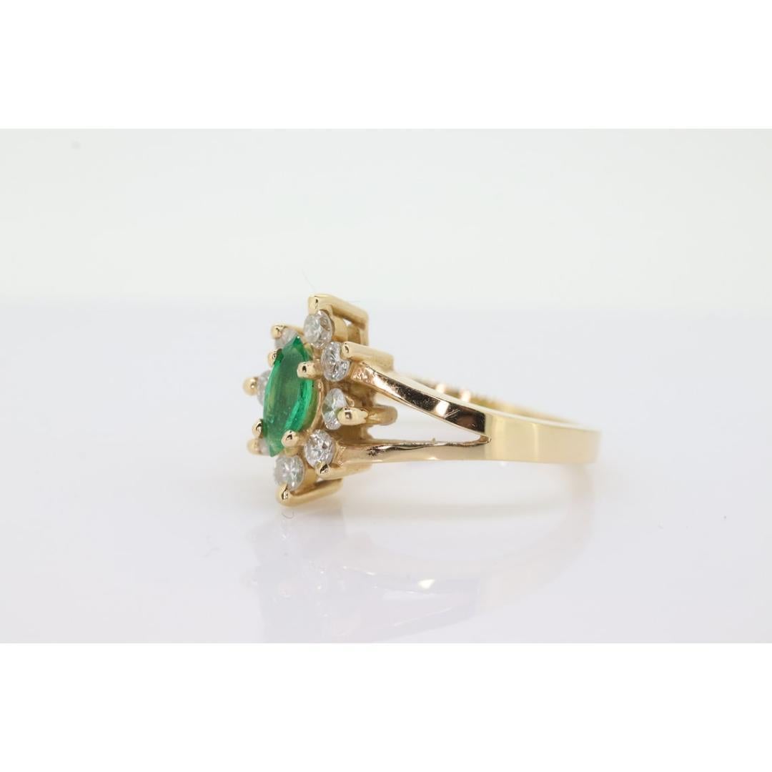 14k Marquise Emerald and Diamond Halo yellow gold ring. 0.36ctw in diamonds 1