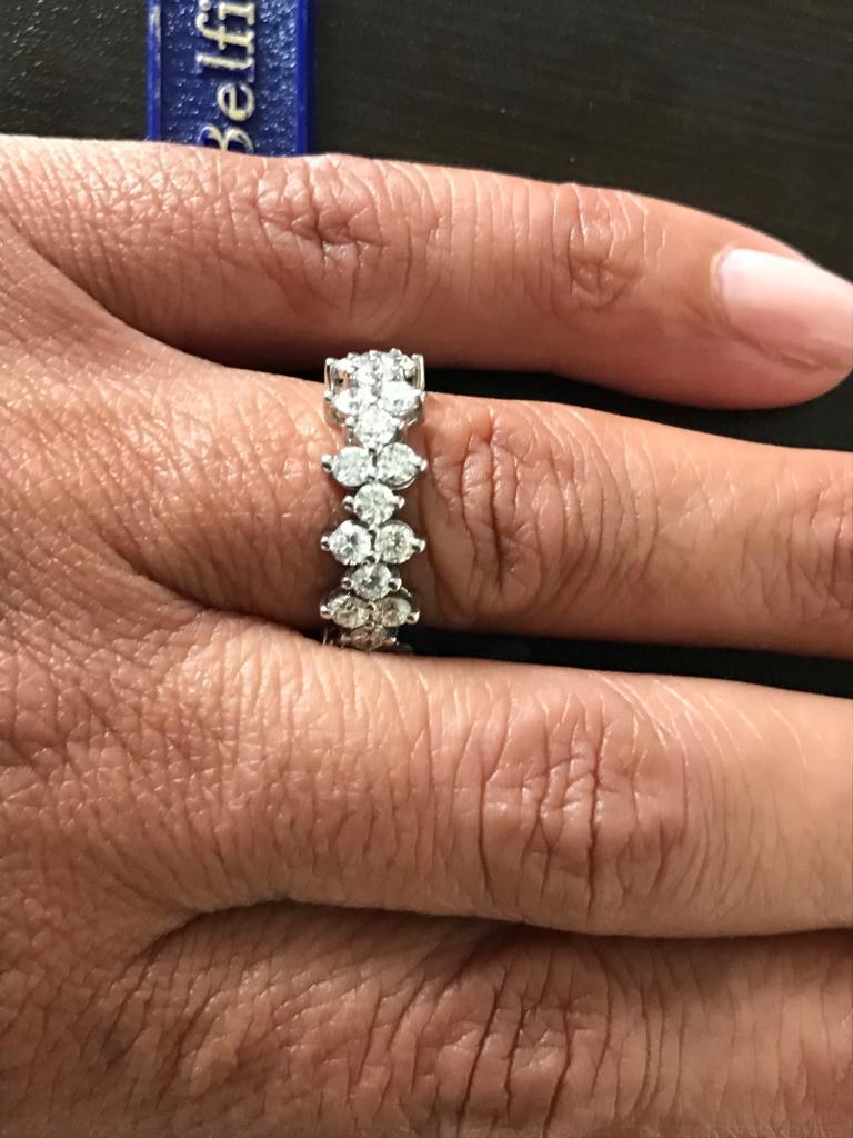 14K Eternity ring set in a marquise style, but set with all round diamonds. The total weight of the ring is 2.73 carats. Each stone weighs approximately 0.07 carats. The color of the stones are G, the clarity is SI1-SI2. The ring size is 6.5 and can