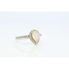 14k Moonstone Diamond Halo ring. Pear Rainbow Moonstone set with Diamonds.