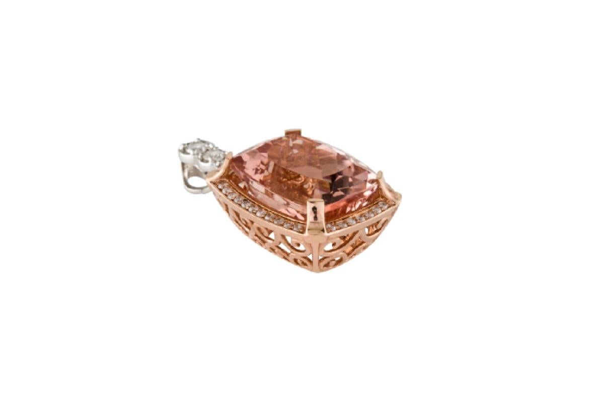 14K rose gold pendant featuring 0.60 carats of round brilliant cut white diamonds and 19.07 oval Morganite and also it is a part of Amy's Regal Collection.

*****
Details:

Metal Type: 14K Rose Gold
Marks: 14K
Metal Finish: High Polish, Rhodium
