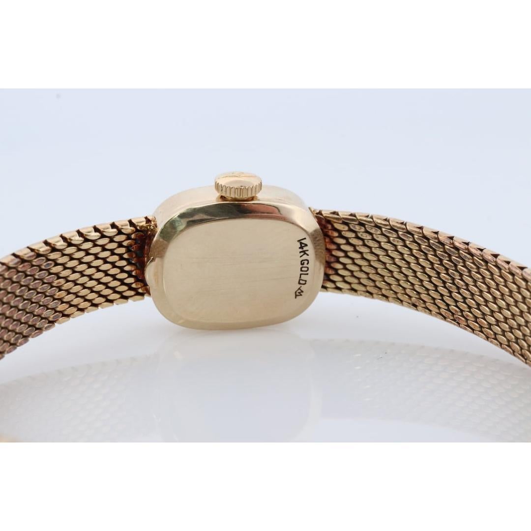 vintage movado ladies watch 14k gold