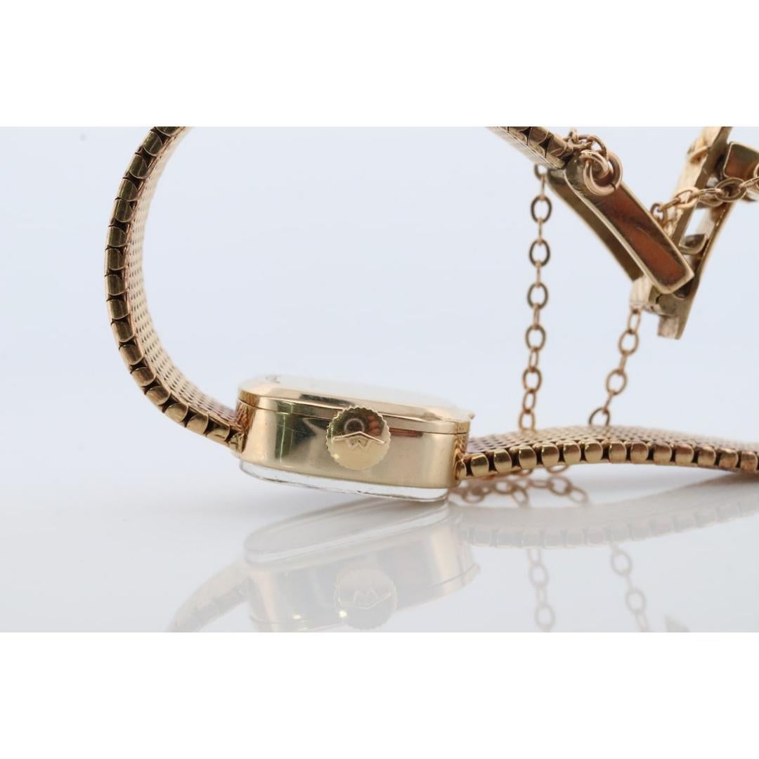 movado vintage gold watch