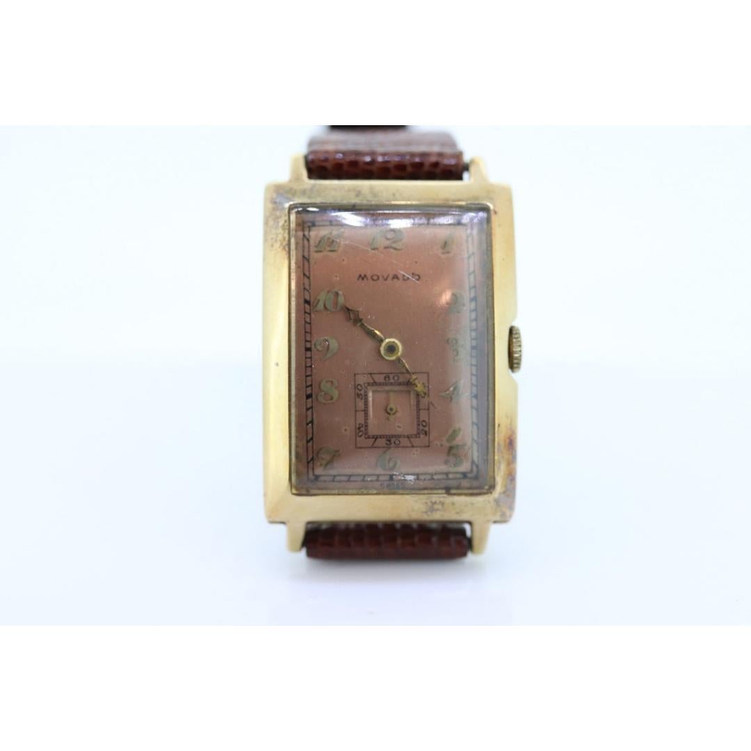 Vintage from the 1920s
Band Material: Gold
Materials: Gold
Power: Mechanical

Readout: Analog

Extremely Rare MOVADO 14k Watch. The case is 14k Rose Gold. Manual windup. Vintage Leather Band.

Condition - Winds up and ticks beautifully. Will need