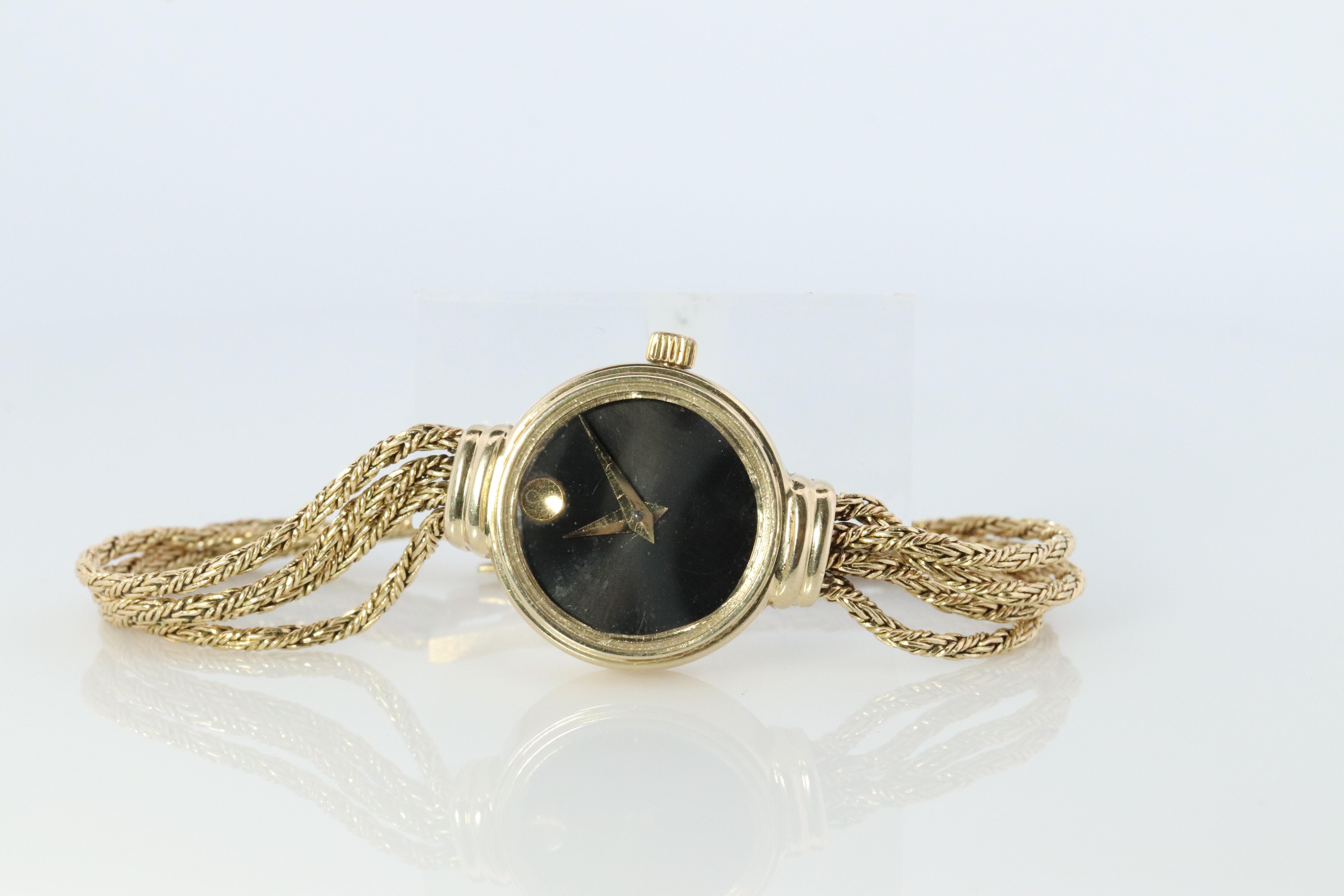 vintage movado ladies watch 14k gold