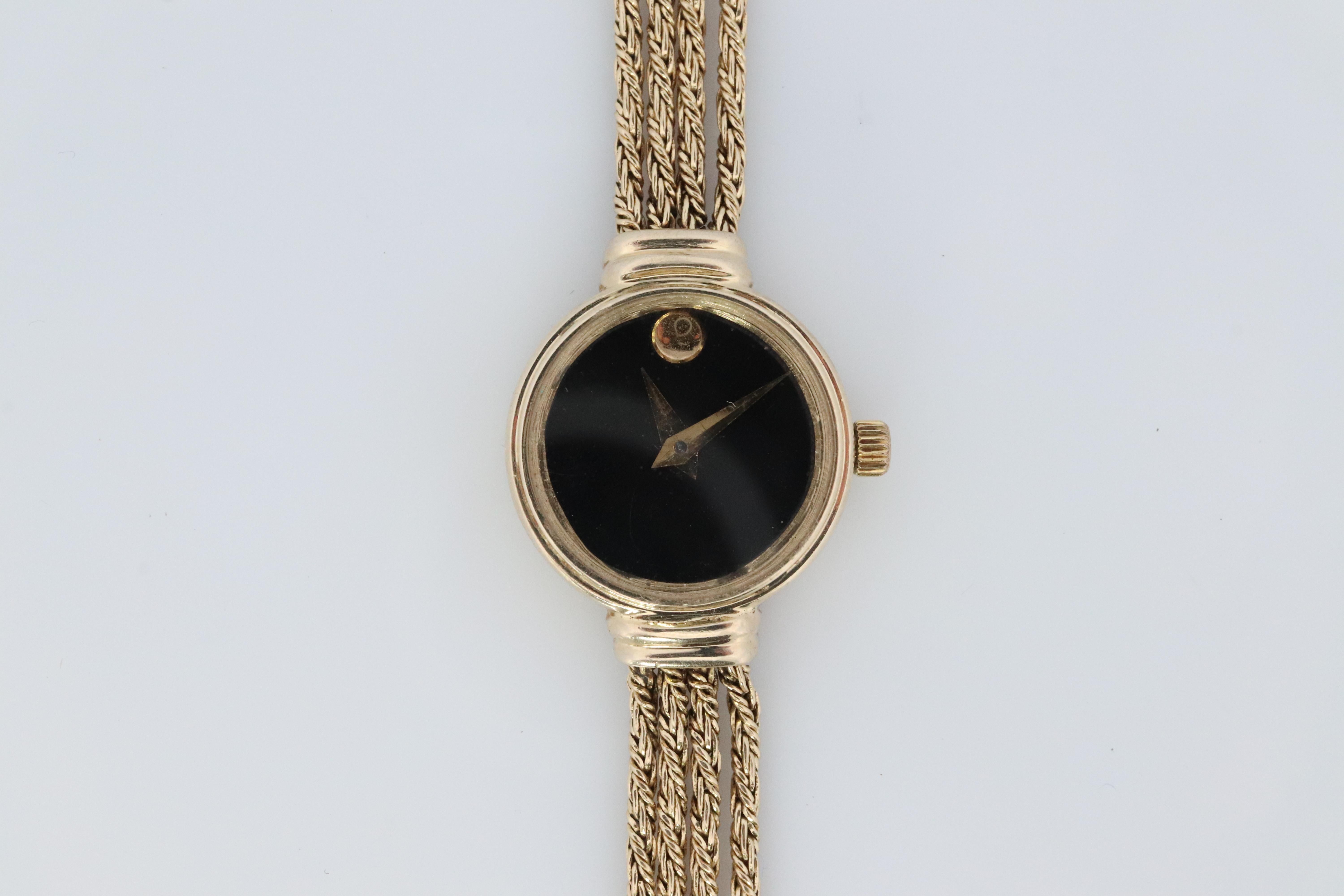 14k MOVADO Watch. 14k Yellow Gold Ladies Movado Rope Bracelet D43 Wristwatch In Good Condition For Sale In Port Charlotte, FL