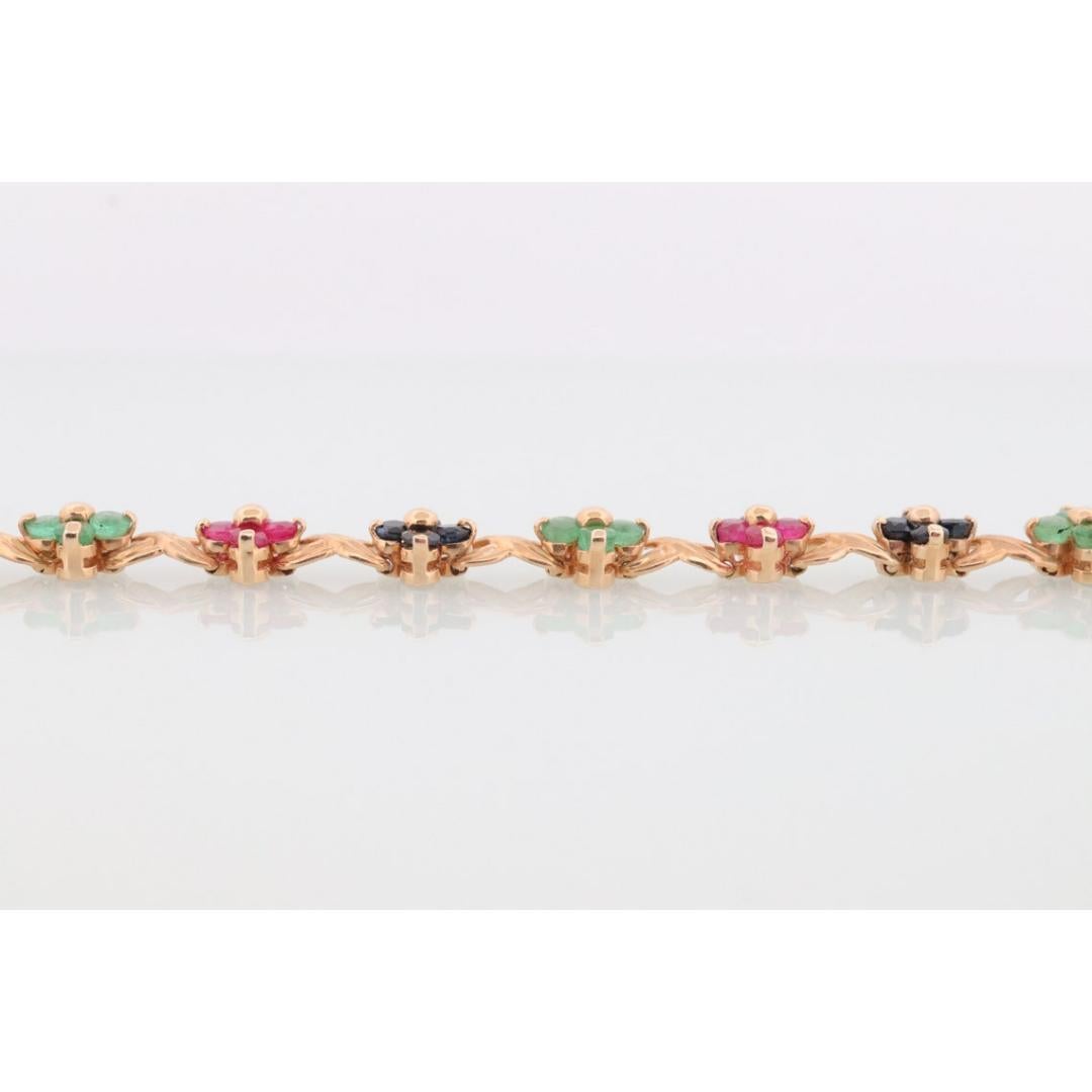 14k Mehrfarbiges Edelsteinarmband. Schwere XOXOXO Runde Rubin-Smaragd-Saphir-Blume im Zustand „Gut“ in Port Charlotte, FL