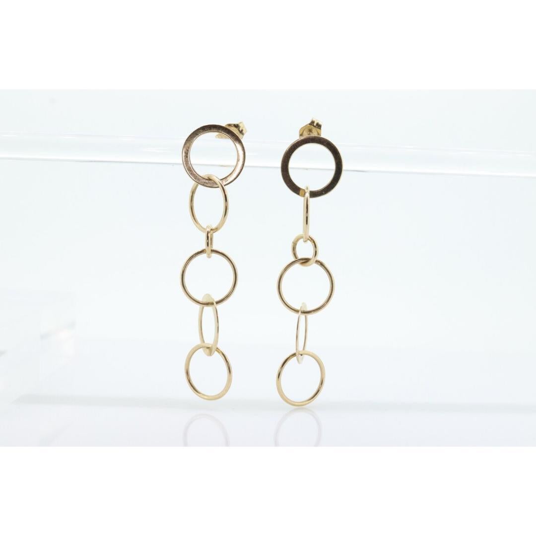 Orecchini pendenti in oro 14k NABCO. Dischi a cerchi intrecciati in oro giallo 14k. in vendita 3