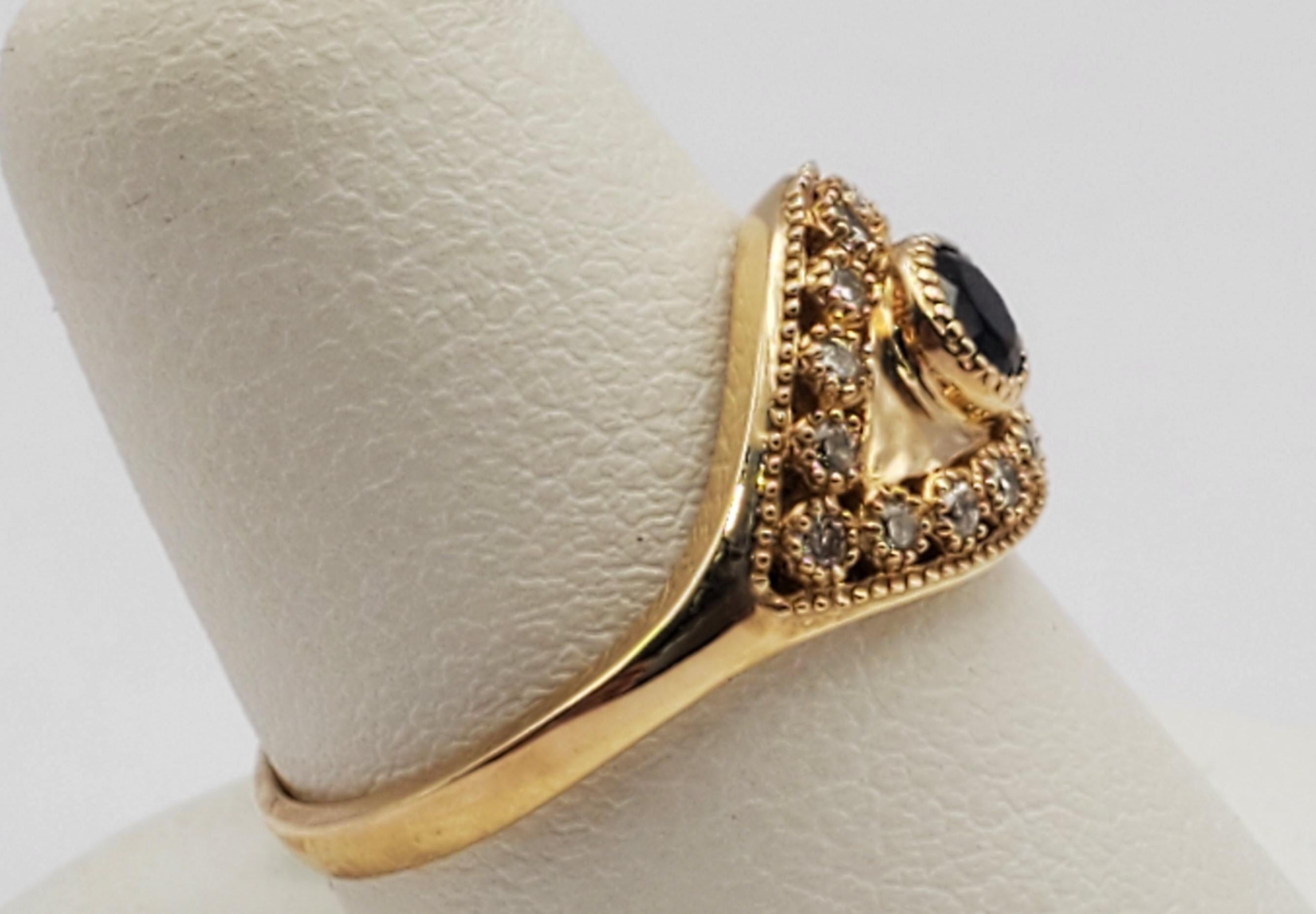 Striking natural blue sapphire and diamond evil eye ring. This ring features 16 round brilliant cut diamonds with a total weight of 0.25cts surrounding a round brilliant cut sapphire weighing 0.25cts. Although it was made in the 21st century, the