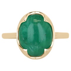 Bague solitaire de 14 carats en émeraude ovale taillée en cabochon avec vert foncé moyen