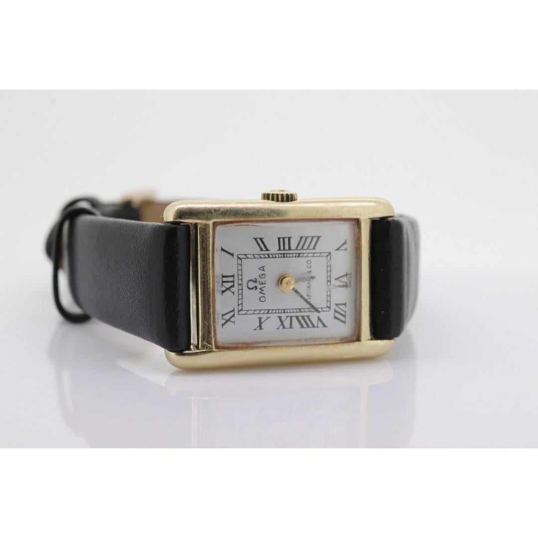 14k OMEGA x Tiffany & Co Tank Watch.14k Gelb Handaufzug Omega 17j Rectangle im Zustand „Gut“ in Port Charlotte, FL