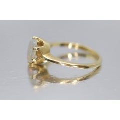 14k Opal Solitaire Claw set ring. Crystal Opal solitaire band.