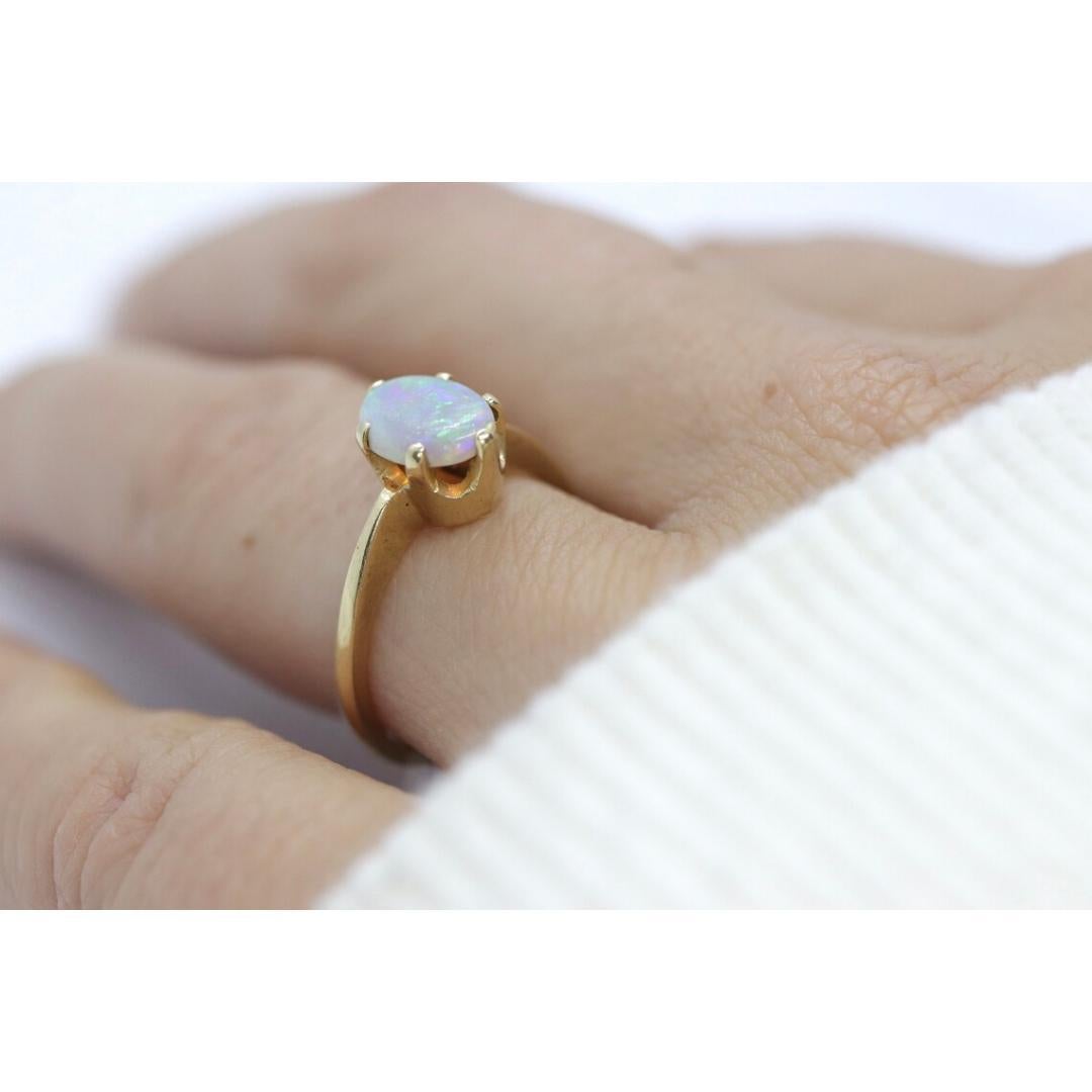 Women's 14k Opal Solitaire Claw set ring. Crystal Opal solitaire band. For Sale