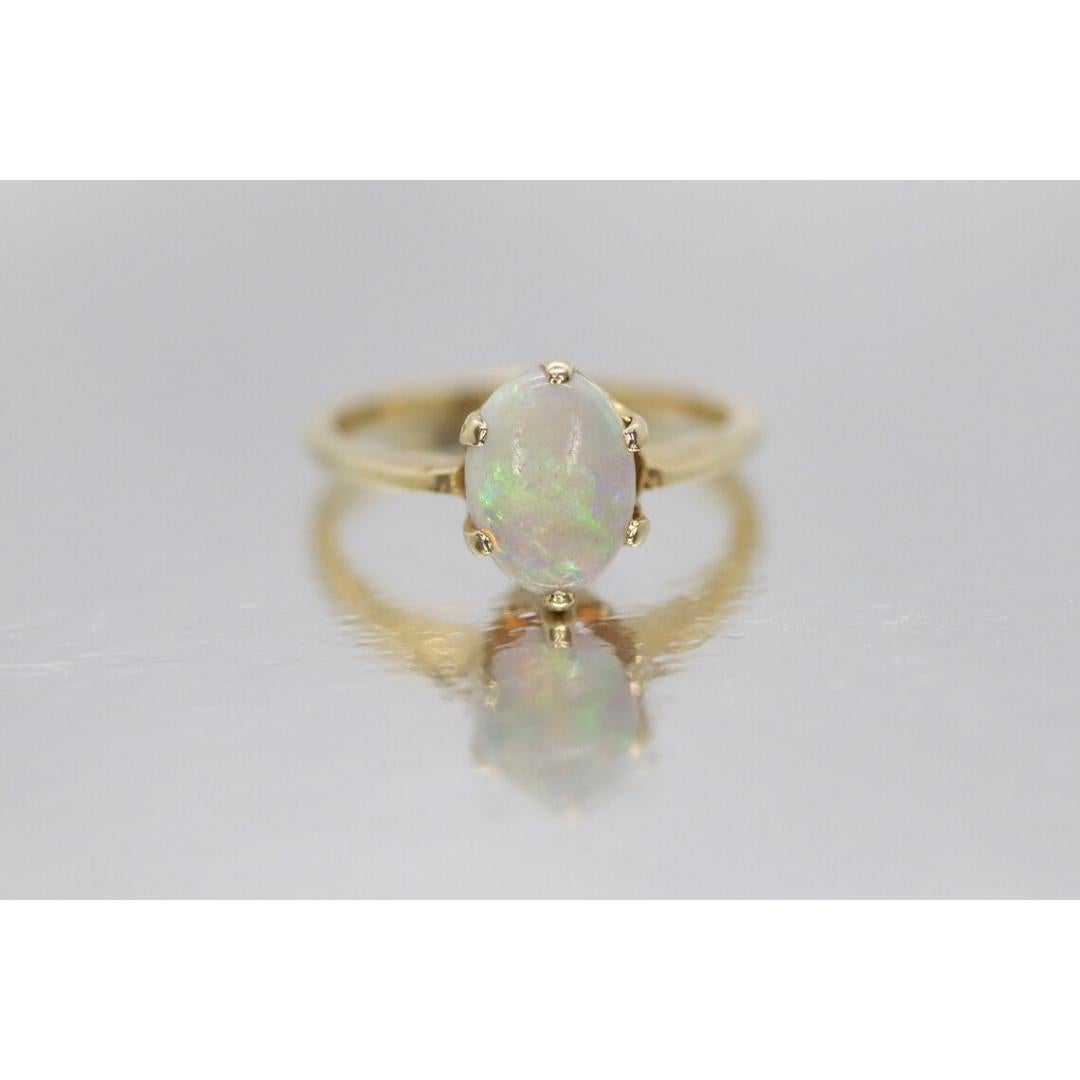 14k Opal Solitaire Claw set ring. Crystal Opal solitaire band. For Sale 1