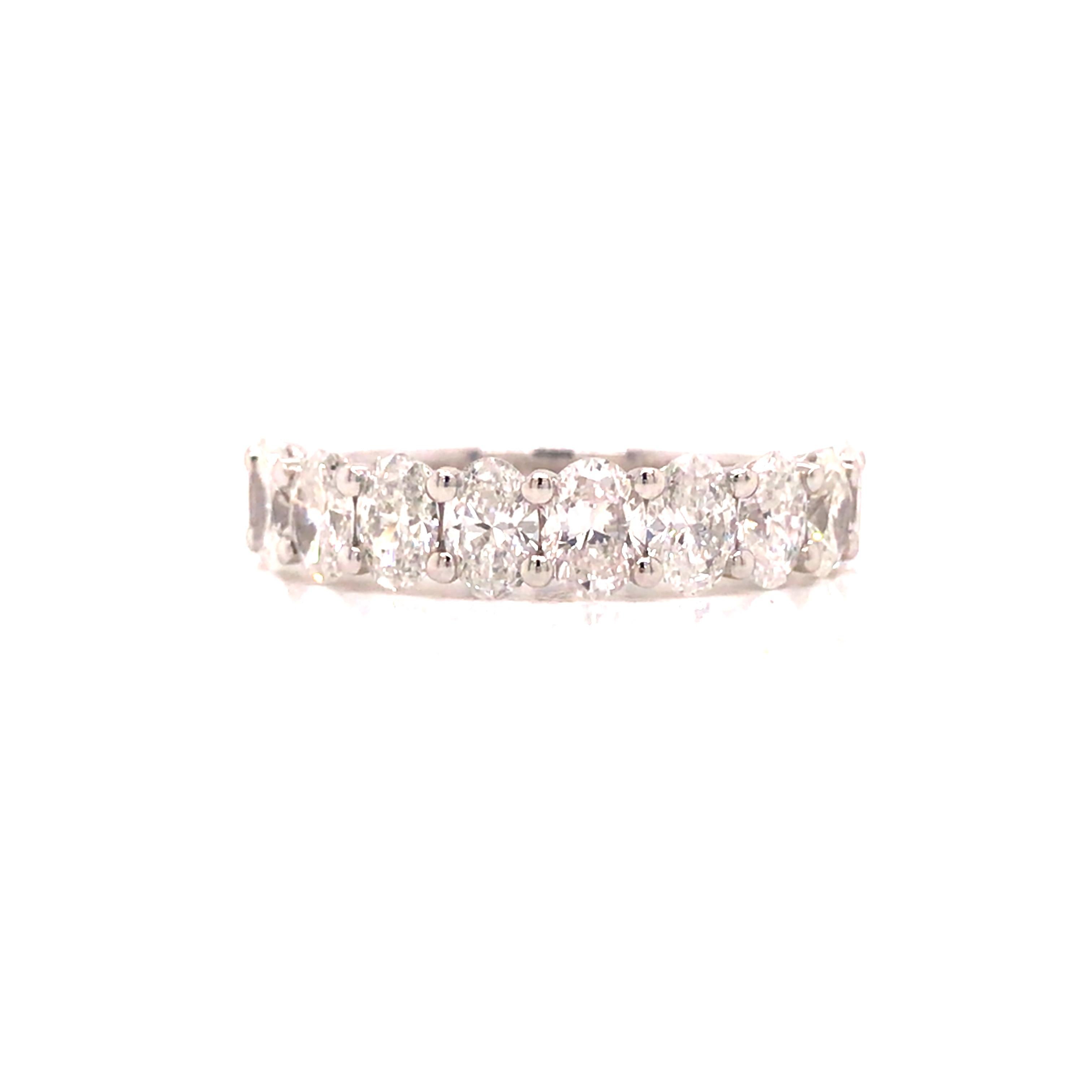 Oval Diamond Halfway Eternity Band in 14K White Gold.  (10) Oval Diamonds weighing 2.0 carat total weight, G-H in color and VS-SI in clarity are expertly set.  The Band measures 3/16 inch in width.  Ring size 6 1/2. 2.7 grams.