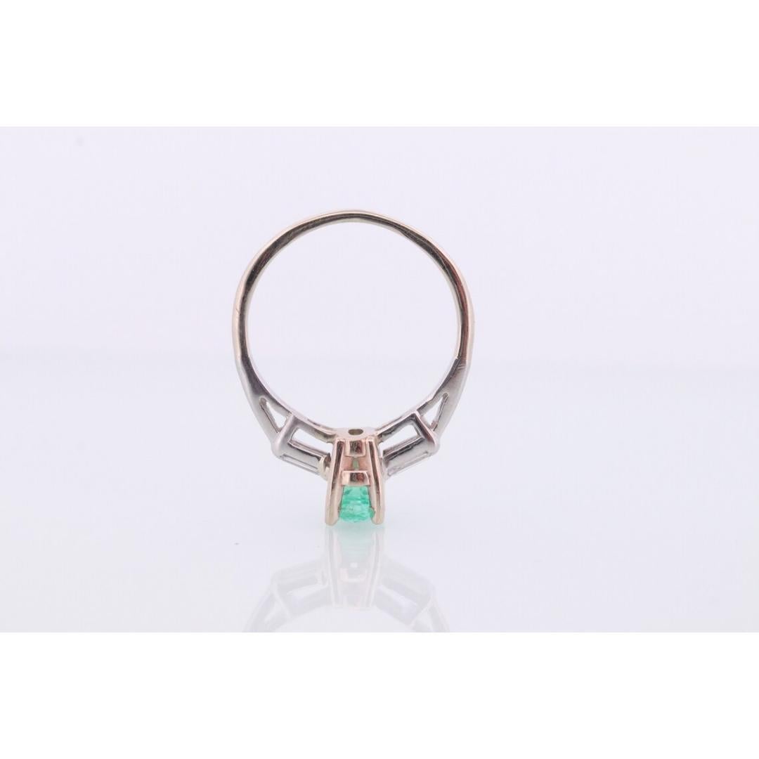14k Oval Emerald and Baguette diamond ring. 14k white gold Green Emerald In Good Condition For Sale In Port Charlotte, FL