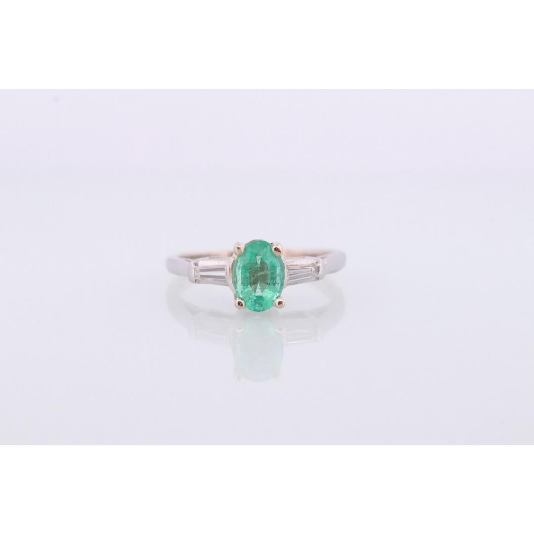 Women's 14k Oval Emerald and Baguette diamond ring. 14k white gold Green Emerald For Sale