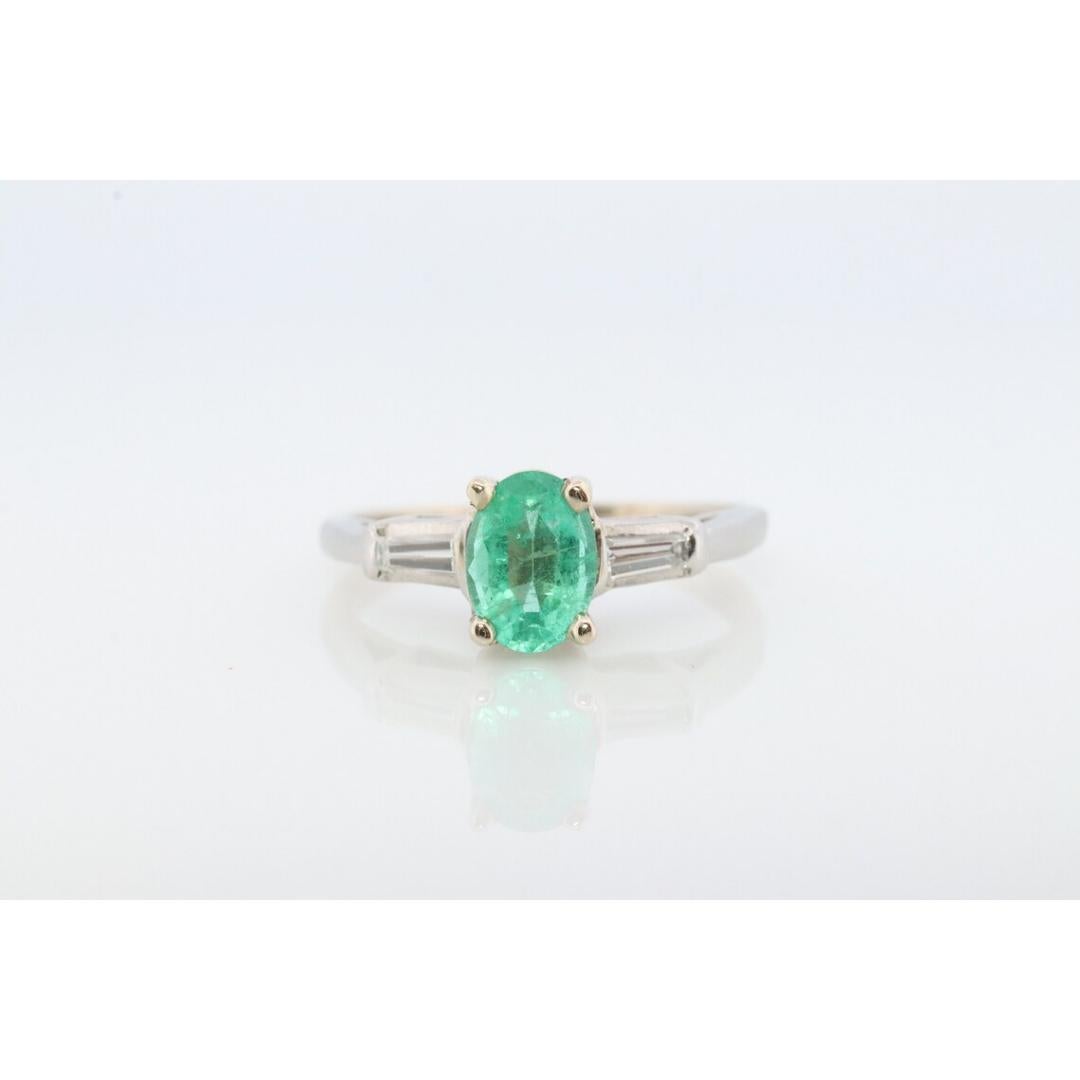 14k Oval Emerald and Baguette diamond ring. 14k white gold Green Emerald For Sale 1