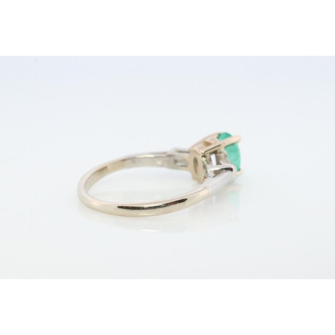 14k Oval Emerald and Baguette diamond ring. 14k white gold Green Emerald For Sale 3