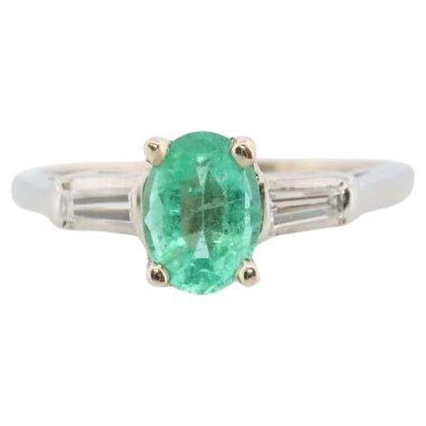 14k Oval Emerald and Baguette diamond ring. 14k white gold Green Emerald For Sale