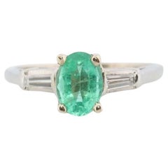 14k Oval Emerald and Baguette diamond ring. 14k white gold Green Emerald