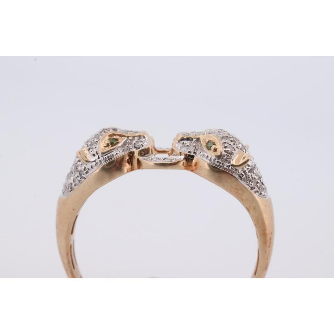 Vintage from the 1950s
Materials: Gold
Gemstone: Diamond
Gem color: Blue
Band color: White

Style: Avant garde

Beautiful encrusted Panther Leopard or Cheetah with Diamonds.

Eyes are set with green diamonds.

4.6grams total weight
Encrusted with