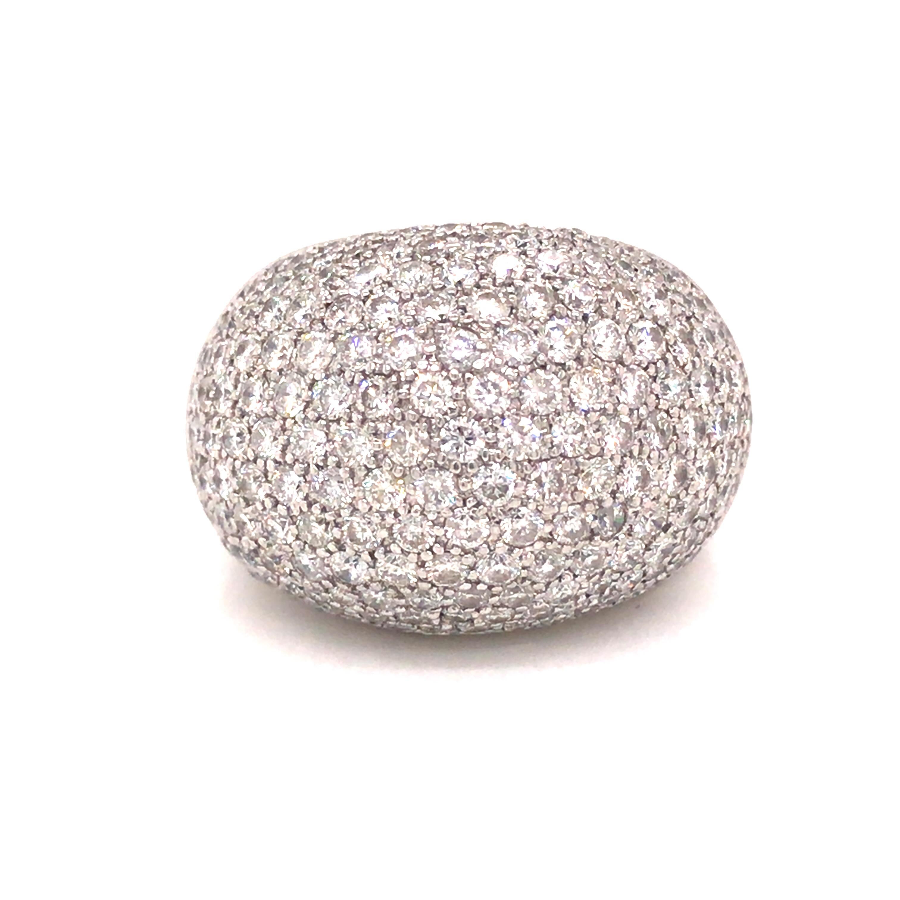 Pave Diamond Dome Band in 14K White Gold.  212 Round Brilliant Cut Diamonds weighing 4.0 carat total weight, G-J in color and VS-I1 in clarity are expertly set.  The Ring measures 3/8 inch in height and 3/4 inch in width.  Ring size 7. 14.77 grams.