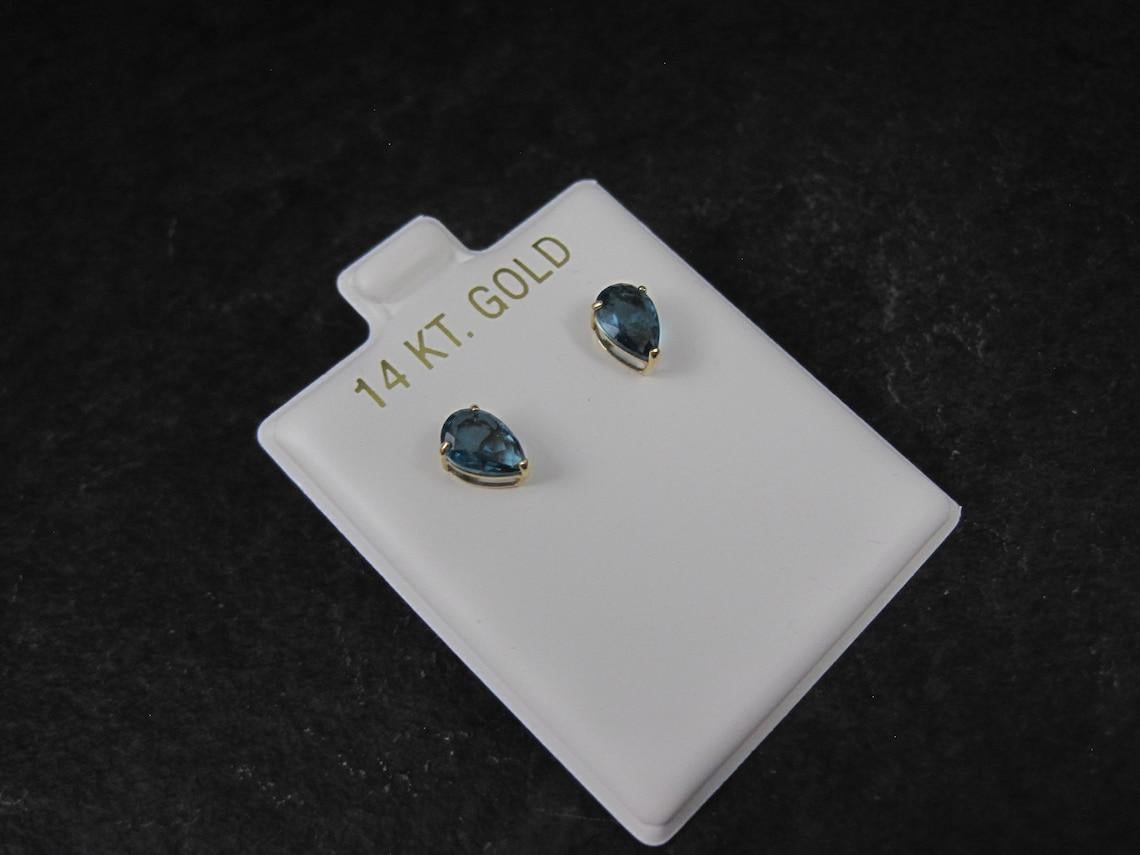 Women's or Men's 14K Pear Cut Blue Zircon Stud Earrings For Sale
