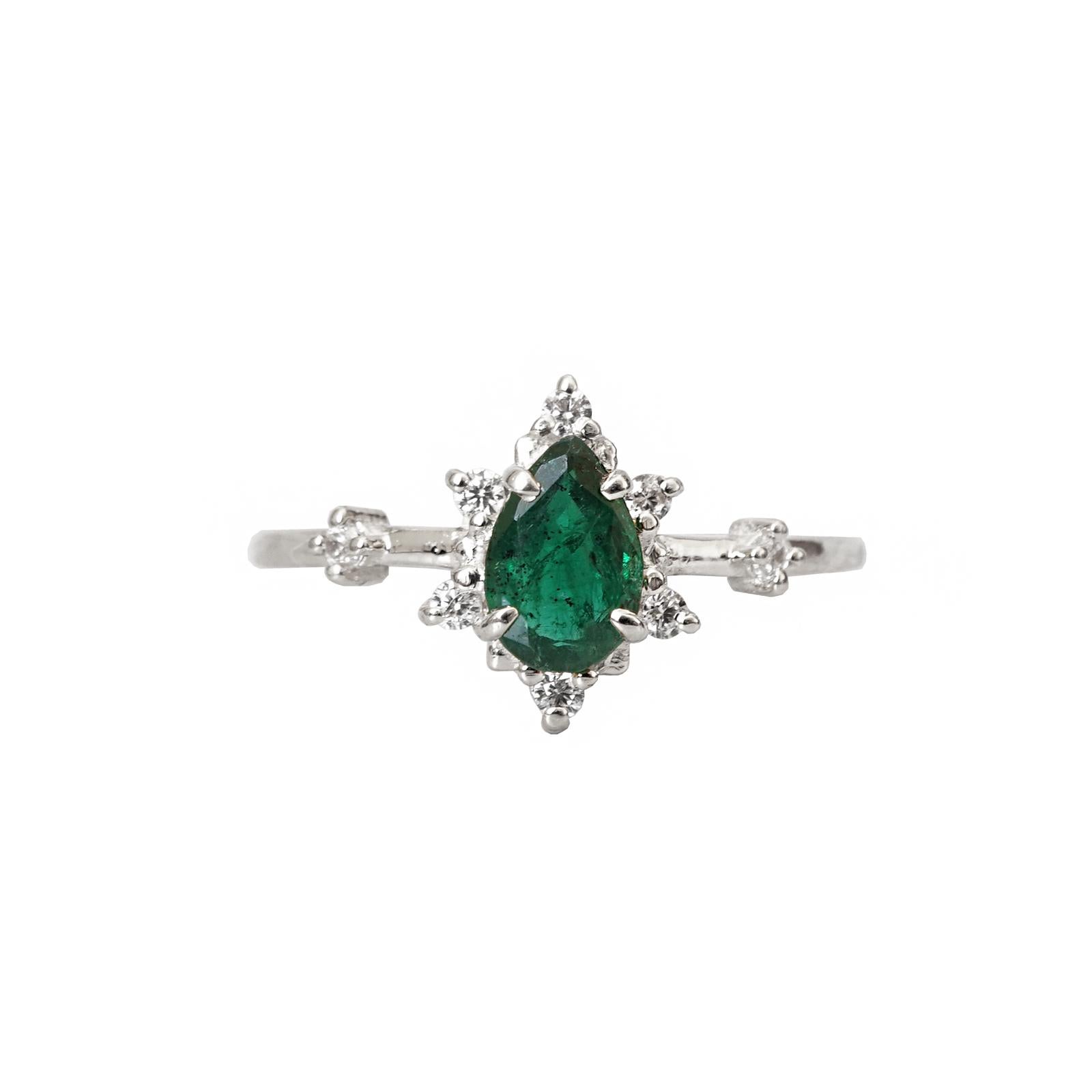 **This item is specially made for you. Please allow 1-2 week lead time. Indicate your ring size during checkout.

A ring of wisdom, truth and love. This Pear Emerald Diamond ring features a stunning rich green emerald set in 14K solid yellow gold