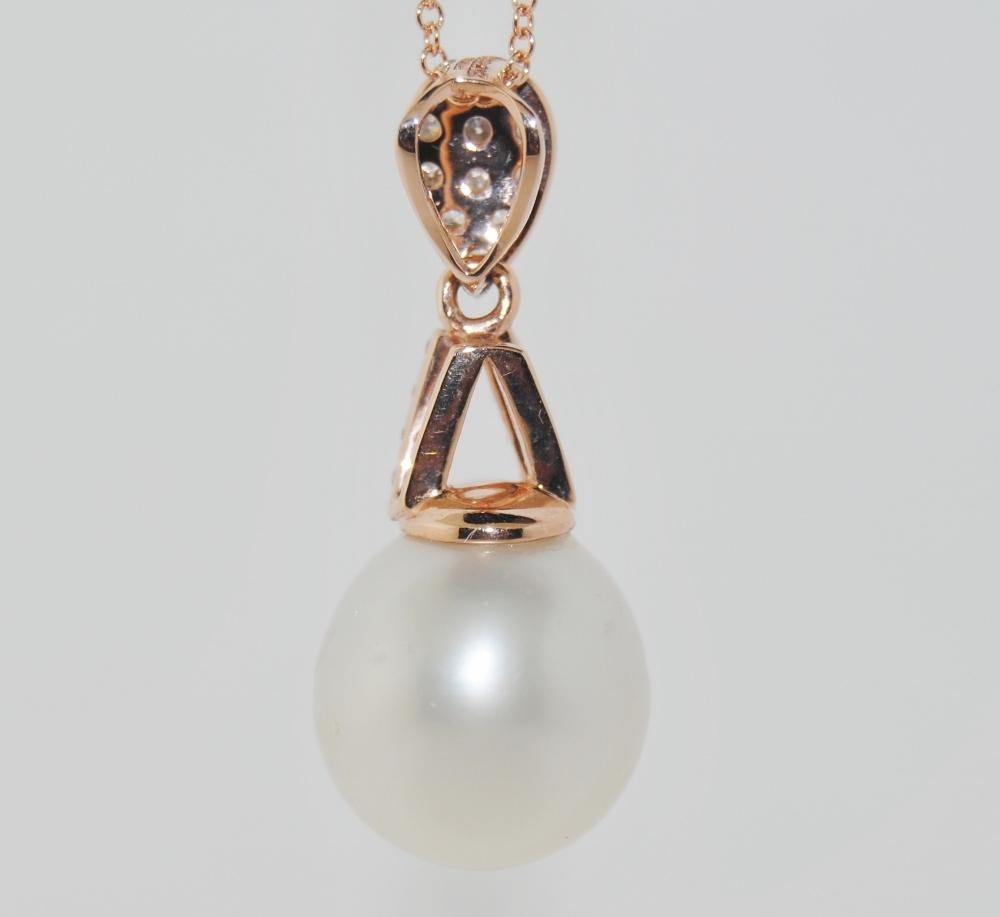 Round Cut 14 Karat Pearl and Diamond Pendant Necklace For Sale