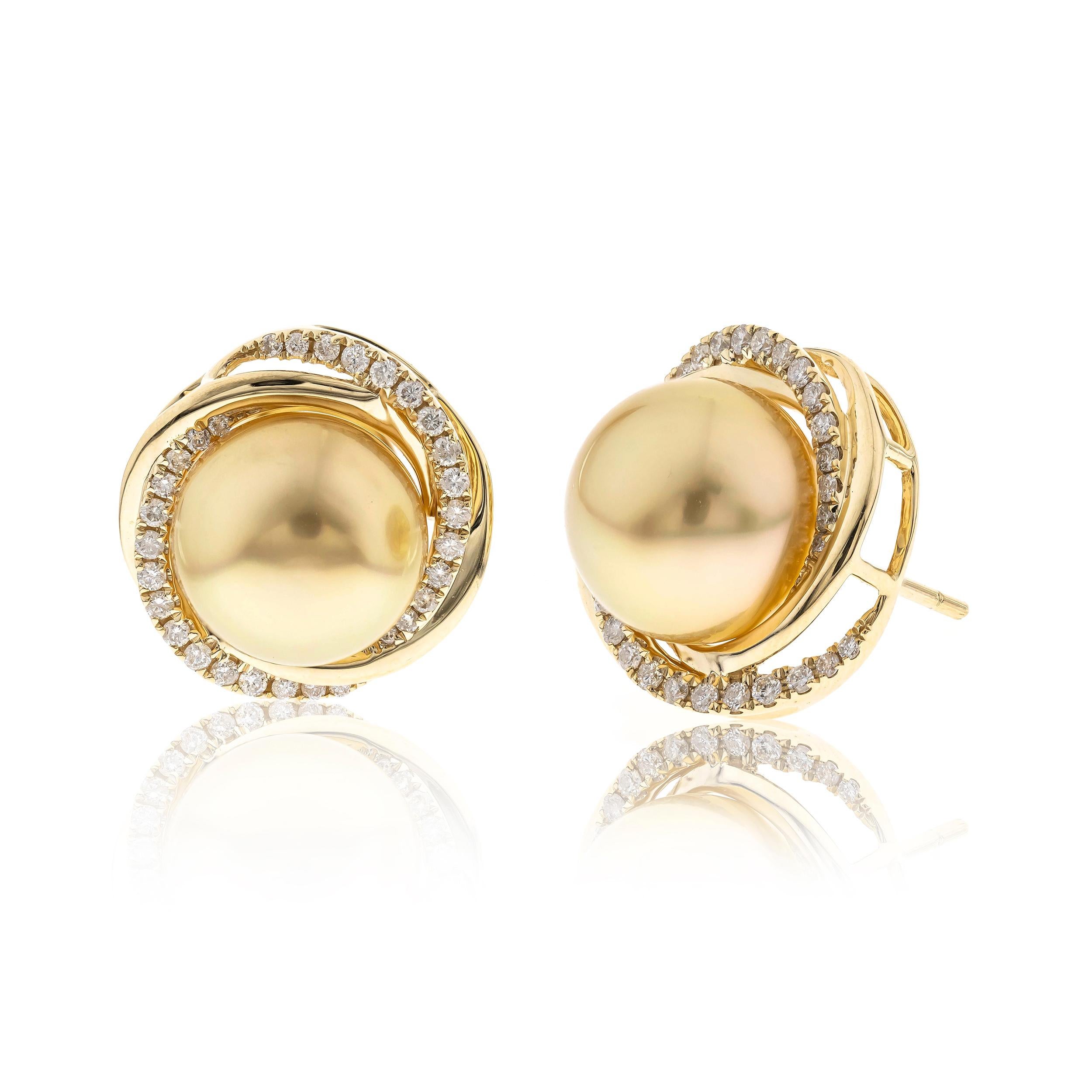These exquisite 14K Yellow Gold earrings feature lustrous Natural South Sea pearls, totaling an impressive 25.83 carats, radiating timeless elegance and sophistication. The pearls are beautifully complemented by natural white diamond accents