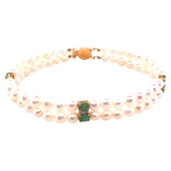 Armband aus 14 Karat Perlen, Smaragden und Diamanten