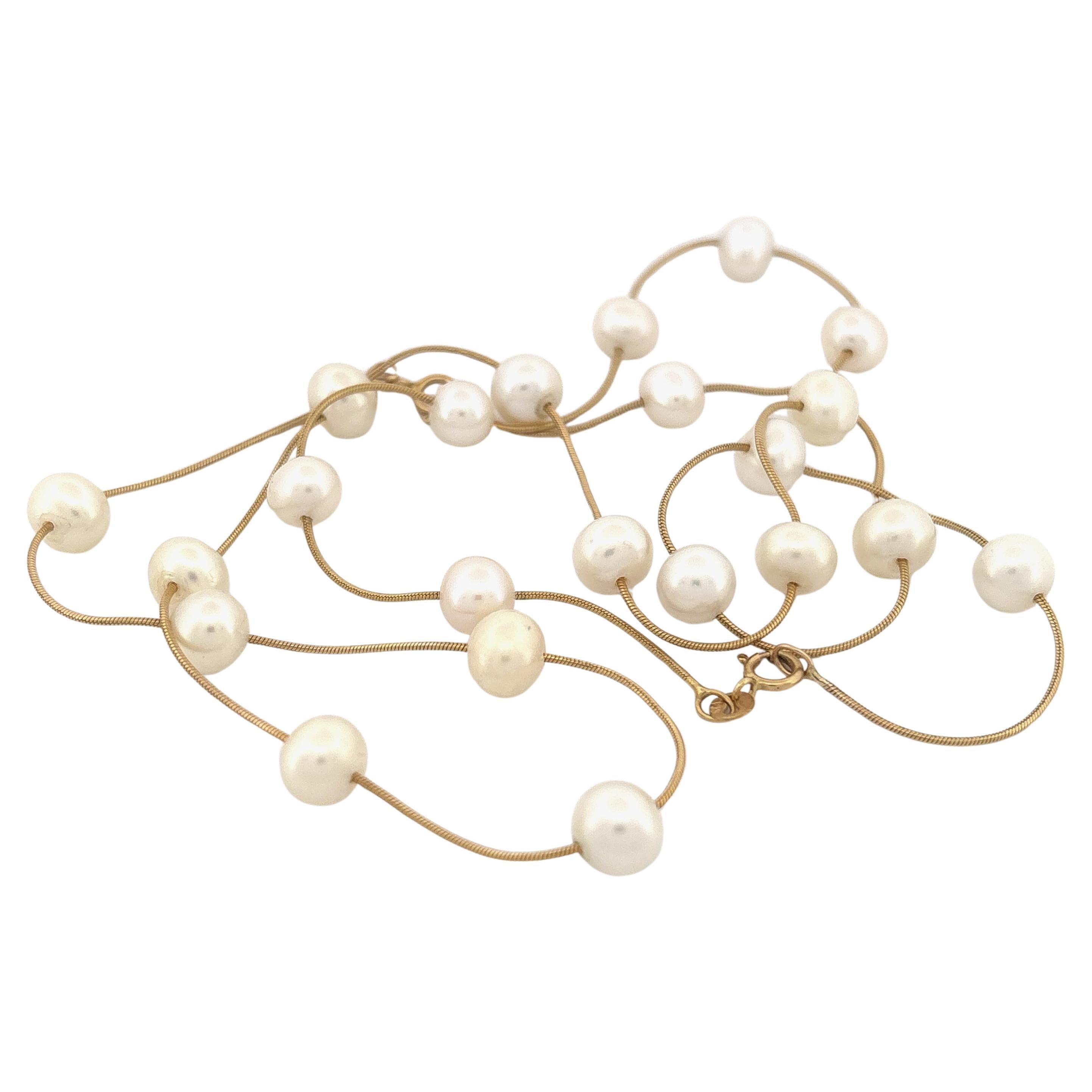 Set di collana e bracciale di perle in oro giallo 14K, fine XX secolo