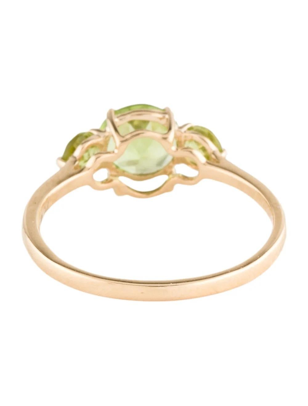 14K Peridot Cocktail Ring Size 6.75: Vibrant Green Gemstone, Elegant Yellow Gold In New Condition For Sale In Holtsville, NY