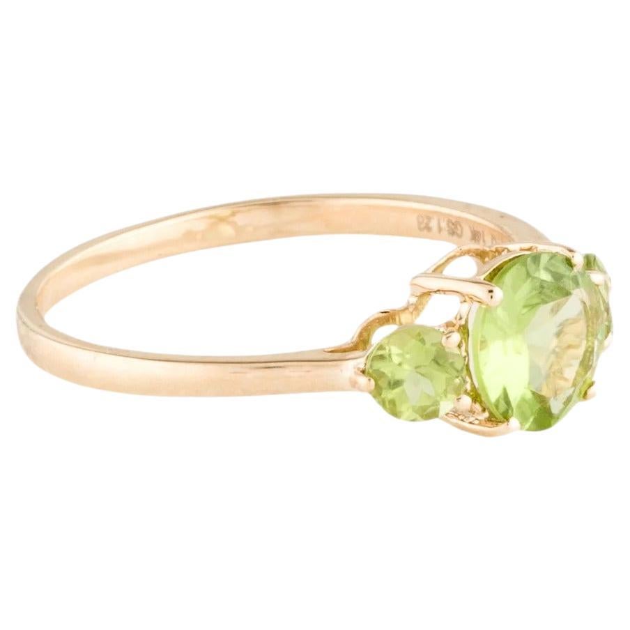 14K Peridot Cocktail Ring Size 6.75: Vibrant Green Gemstone, Elegant Yellow Gold For Sale