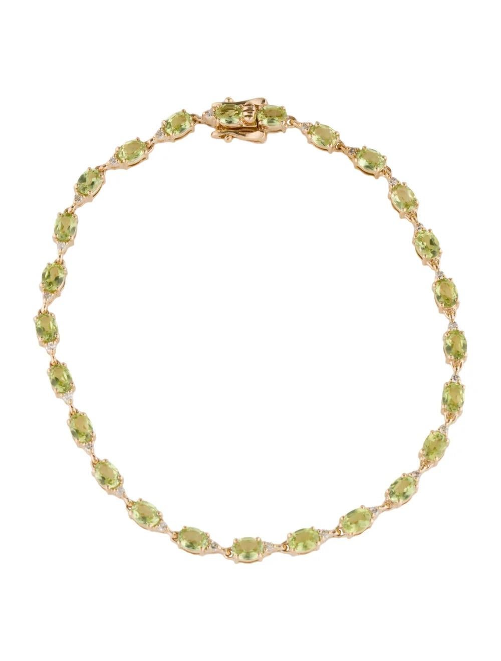 Elevate your style with this exquisite 14K Yellow Gold Tennis Bracelet, adorned with Oval Modified Brilliant Peridots and sparkling Diamonds. Crafted to perfection, this bracelet exudes elegance and sophistication, making it a timeless addition to