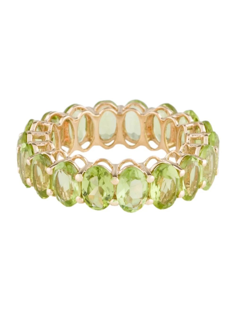 Oval Cut 14K Peridot Eternity Band Ring - Size 7, Timeless Style, Vibrant Green Gemstones For Sale