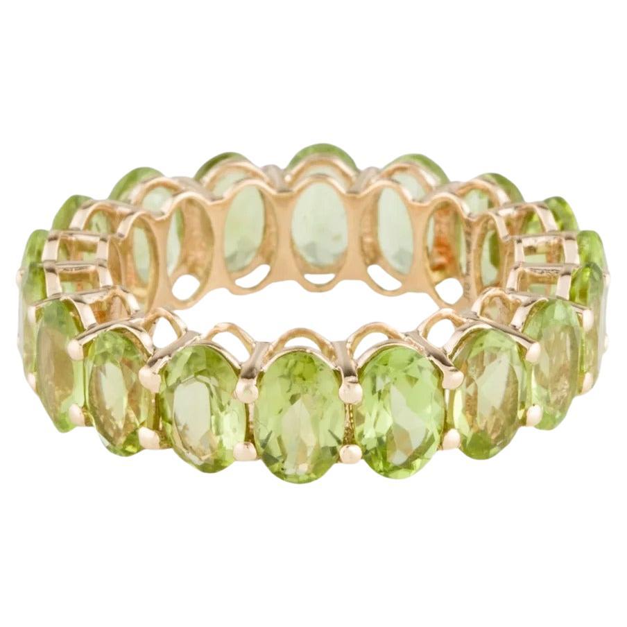 14K Peridot Eternity Band Ring - Size 7, Timeless Style, Vibrant Green Gemstones For Sale