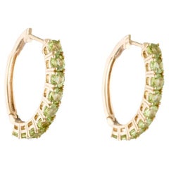 14K Peridot Hoop Earrings - Elegant Green Gemstones, Timeless Statement Jewelry