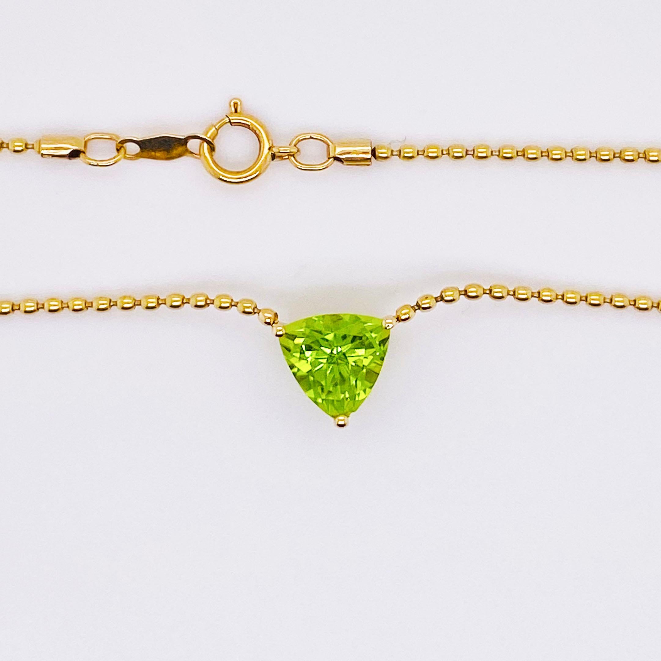 Trillion Peridot 1.25cts Stationary Pendant Necklace 14K Yellow Gold
This is a simple but exquisite peridot pendant with a 1.25 carat trillion (triangular brilliant cut) genuine gemstone set in a tailored setting.  The entire necklace is 14 karat