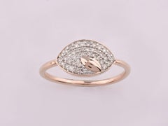 Bague imposante en or rose 14 carats, avec diamants sertis en pavé, de forme marquise