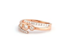 14K Pink Gold Round Cut Diamond Bezel Three-Stone Bypass Ring