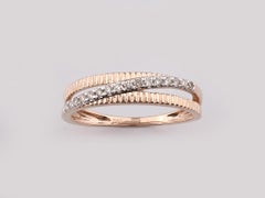 Bague croisée cannelée en or rose 14 carats sertie d'un diamant taille ronde