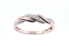 Anello con diamante a taglio rotondo in oro rosa 14 carati, con design a infinito intrecciato