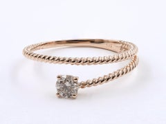 Bypass-Ring aus 14-karätigem Roségold mit rundgeschliffenem Diamanten im gedrehten Seil-Design