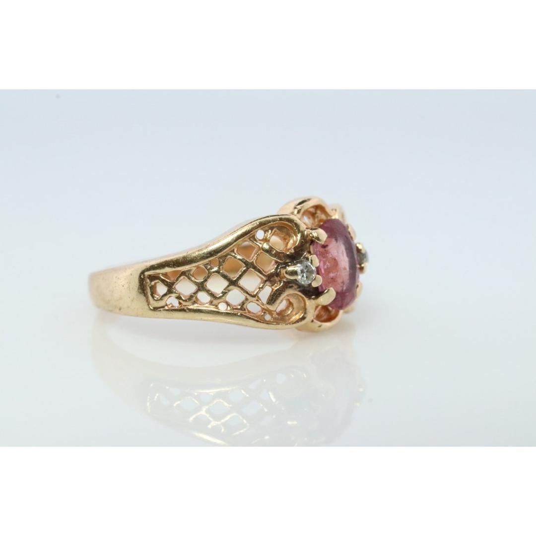 14k Pink Tourmaline Ring. prong set OVAL Tourmaline solitaire with diamond In Good Condition For Sale In Port Charlotte, FL