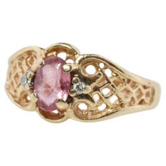 14k Pink Tourmaline Ring. prong set OVAL Tourmaline solitaire with diamond